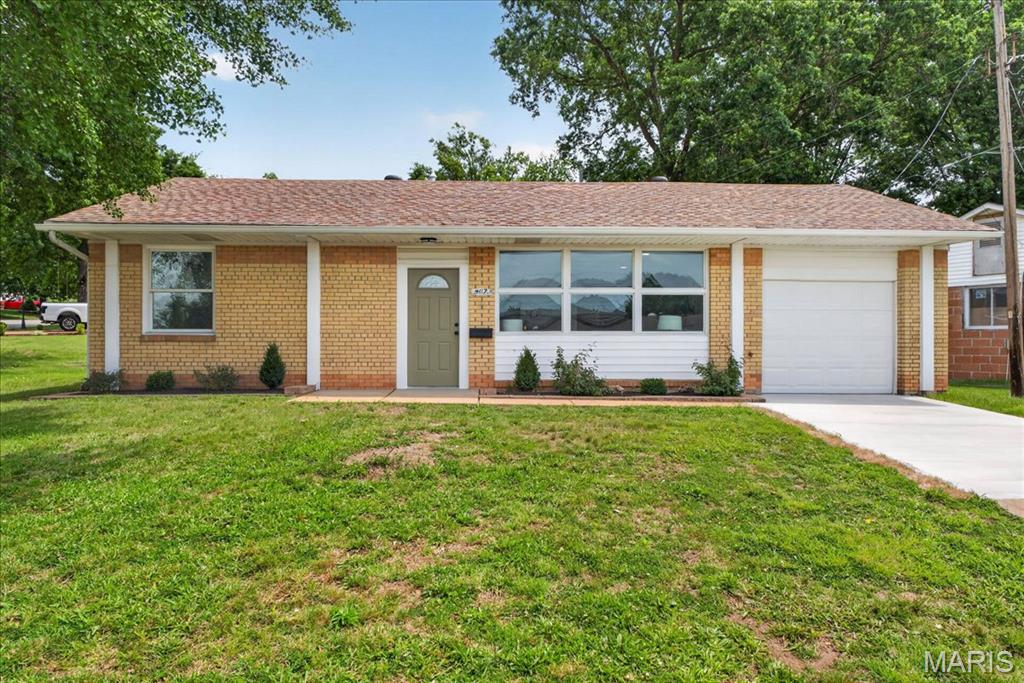 Cute as can be renovated and move in ready! Perfectly configured three bedroom one bathroom home at a great price in Boulevard Heights.  Built in 1952 with that rare light brick! Think turn key investment property or occupy and enjoy.  Completely remodeled top to bottom. Showing off restored & elevated finishes. The quaint kitchen features new cabinetry, quartz countertops, flooring, custom tile backsplash with new appliances plus roomy laundry room off the one car garage. A back bedroom off the kitchen is the ideal home office, or styled storage space; this leads to a private patio and lawn that is just the right amount of green space to make your own.  Sitting on a large curved corner lot.  Two spacious bedrooms and updated bathroom make for a great flow in this small but mighty ranch home.  Minutes from the Great River Greenway trails, Carondelet Park & Willmore Park.  All new HVAC, reconfigured laundry room, all new flooring and carpet, and new garage door., nothing has been overlooked.  Remodeled with the highest quality standards.