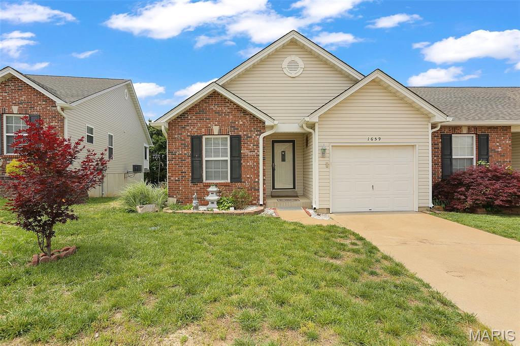 Beautifully updated 2 bed, 2 bath ranch style villa in a great location.   Pride of ownership shows in this home with wood flooring throughout and tastefully updated.   Nice kitchen with plenty of cabinet and counter space opens into the breakfast room and vaulted great room.   Primary bedroom with walk in closet and private bathroom.  Another full bath and bedroom on the main floor along with laundry.   Covered composite deck off the back.   Lower level has been framed to be finished and offers a walk out to a patio backing to trees.   Plenty of storage space in the lower level and a 1 car garage.  The HVAC system has been upgraded within the past year and the roof is brand new.  This villa is move in ready in a great community with clubhouse, pool and low HOA fees.