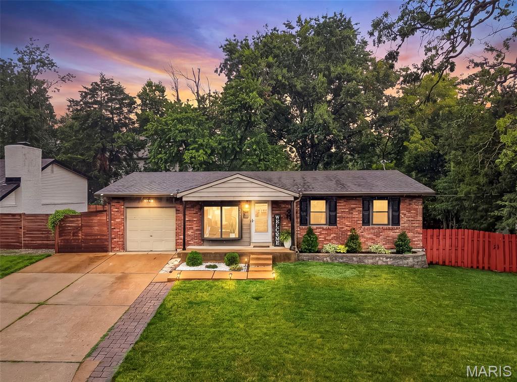 Open House Sunday 7/19 1-3 PM!!! Welcome to 347 Lillian Ave, just steps from Fillmore Park! A charming 3 bedroom, 2.5 bath ranch home in the highly rated Kirkwood School District on a corner lot with over 1,800sf of living space! Step inside to discover a welcoming layout filled with natural light and comfortable living spaces. The functional kitchen offers abundant cabinetry and storage, complete with a gas range, built-in microwave, and stainless steel refrigerator. Just beyond, the bright sun porch opens to a generous, tree-lined backyard with deck, an ideal setting for morning coffee, gatherings, or peaceful evenings outdoors. The main level features 3 bedrooms, a full hall bath and primary half bath. The finished lower level includes a full bath and versatile space with a large rec room, an office or sleeping area, and ample storage. Oversized attached one-car garage with a two-car driveway, offering ample off-street parking. Nestled in a prime neighborhood with easy access to parks, the vibrant downtown Kirkwood, and major commuting routes, this home provides the perfect blend of convenience and everyday comfort. A wonderful opportunity for buyers seeking a solid home with strong bones in a top location.