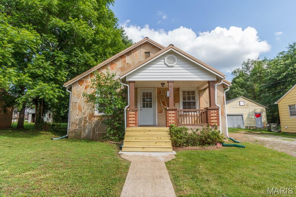 Charming and move-in ready, this beautiful 2-bedroom, 1-bath home offers over 1,000 square feet of comfortable living space. The infamous Giraffe stone exterior and welcoming covered front porch create excellent curb appeal and a warm first impression.

Inside, you’ll find an open-concept living and dining area filled with natural light, highlighted by beautiful wood floors and a spacious, inviting layout. The updated kitchen features all appliances, newer cabinetry, ample storage, and plenty of workspace for everyday living and entertaining.

The renovated bathroom adds modern style and convenience, while the oversized utility room provides extra flexible space for storage, hobbies, or a home workspace. A large walk-in storage closet in the utility room offers even more room to stay organized.

Step outside to enjoy the spacious backyard with a gazebo, perfect for gatherings, gardening, pets, or simply relaxing outdoors. Combining character, updates, and functionality, this home is a wonderful opportunity for first-time buyers, downsizers, or anyone looking for comfortable, low-maintenance living.

This home will go all loan types.  Call today for your private showing.