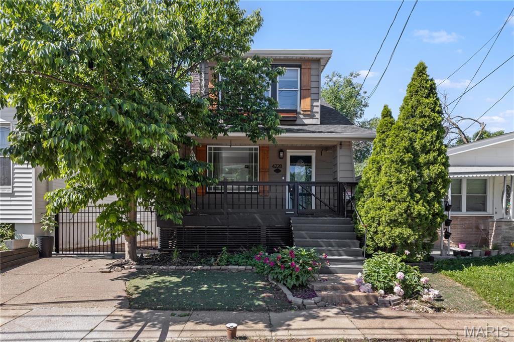 Charming South City gem in St. Louis! This adorable 2-bedroom, 2.5-bath 2 story home has great curb appeal starting with the large covered porch. Inside, you’ll find a bright, open feel with tons of natural light, fresh paint, a fireplace, dining room and kitchen with plenty of cabinet space and white cabinetry,  Upstairs you'll find 2 bedrooms and a spacious bathroom with a large soaking tub. In the basement your greeted with more finished living space. a flex/sleeping room, another full bathroom and access and walkout access to the backyard. The expansive covered deck and fenced backyard add even more charm for relaxing or entertaining. Don’t miss this delightful, move-in-ready home—come see it today!