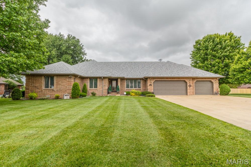 WELCOME  TO THIS ALL BRICK RANCH STYLE HOME  offering   OVER 2798 SQ FT OF LIVING SPACE   3-4 BEDROOMS, 3 FULL BATH  HOME INSIDE THE CITY IN A GREAT LOCATION .... IT EVEN HAS A 3 CAR GARAGE. !!  A BEAUTIFUL YARD, A  LARGE REAR DECK PERFECT FOR GRILLING OR ENTERTAINING . THE ENTRY FOYER LEADS YOU TO A FORMAL DINING ROOM, A LARGE LIVING ROOM with  A WOOD BURNING Country flame INSERT.  The  LARGE KITCHEN has  NEWER STAINLESS APPLIANCES, BREAKFAST TABLE AREA, 4TH non-conforming BEDROOM or HOME OFFICE. JUST PAST THE LAUNDRY ROOM IS FULL BATH #3.  THE LEFT WING OF THE HOME OFFERS,  3 LARGE BEDROOMS, THE MASTER IS OVERSIZED with A LARGE FULL BATH, WALK IN SHOWER and THE WALK IN JACUZZI TUB. HIS  and HER WALK IN CLOSETS,  'THIS HOME IS OFFERED WITH ONE LOT OR THE  VACANT ADJOINING LOT AT ADDITIONAL COST THAT  ALSO HAS A  NICE STORAGE BUILDING.  

LOCATED ON THE NORTH SIDE OF LEBANON OFFERS GREAT ACCESS TO SCHOOLS,  AND  THE EASY TRIP TO THE LAKE OF THE OZARKS.    MAKE YOUR APPOINTMENT TODAY !