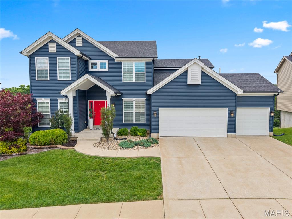 PRICE IMPROVEMENT! Welcome into this gorgeous two-story home located in the highly sought-after Strawberry Ridge subdivision, where luxury, comfort and community come together beautifully! From the moment you step into this impressive home, you are greeted with the two-story foyer with its stunning all wood, split staircase. You'll instantly feel right at home. Designed for both elegant entertaining and every day living. This home features a formal dining room, private office with double doors, and a warm inviting family room highlighted by gleaming wood floors (hardwood floors throughout the home...NO CARPET), built-in bookcases surrounding a gorgeous stone, gas fireplace. The spacious breakfast room opens through sliding glass doors to an oversized, maintenance-free deck.....creating the perfect setting for morning coffee, summer barbecues, or relaxing evenings overlooking the backyard. The kitchen is truly the heart of the home, featuring custom cabinetry, solid surface countertops, double ovens, and two pantries. Makes cooking and hosting effortless.
Convenience meets functionality with a main-level laundry room complete with custom built-ins. Upstairs, the luxurious primary ensuite offers a peaceful retreat with a spa-inspired bath featuring double vanities, a soaking tub, and separate shower. Also features a double closet PLUS a very spacious walk-in closet with custom built-in cabinetry. You'll also find 3 additional generously sized bedrooms and another full bath which provides plenty of room for everyone.
The unfinished walk-out basement offers incredible potential with a 9-foot pour and two egress windows, making it ideal for future living space. There's even a sprinkler system for easy lawn maintenance. Beyond the home itself, Strawberry Ridge offers an exceptional lifestyle with its beautiful clubhouse, large pool, and welcoming neighborhood atmosphere. Whether you enjoy entertaining, working from home, or simply relaxing in comfort, this home truly has something for everyone. ****Be sure to click on the attached video (the movie reel) for the true experience. 
Roof, siding, patio door, kitchen window have all been replaced in the last 6 months. Home has already passed occupancy inspection, Rock Creek sewer lateral inspection, and backflow inspection for the sprinkler system...so ready for a quick sale. This isn't just a home.....IT'S A LIFESTYLE.
