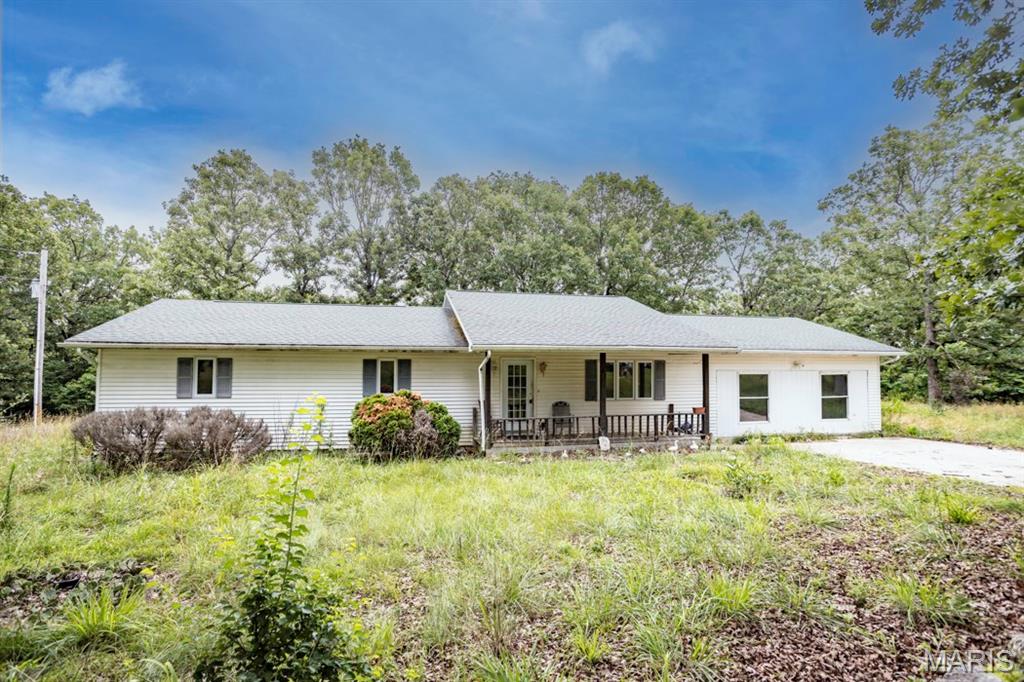 Escape to the perfect blend of comfort and country living with this 3-bedroom, 2-bath home situated on 10 scenic acres. Enjoy peaceful views and outdoor recreation with your own private pond, ideal for fishing or relaxing by the water. The property also features a large shop with ample space for equipment, hobbies, storage, or a home-based business. With plenty of room to roam, garden, hunt, or simply enjoy nature, this property offers endless possibilities while providing the privacy and tranquility you've been looking for.
