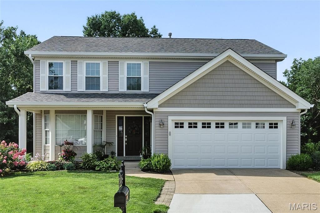 Welcome home to this beautifully maintained 2-story home nestled on a quiet cul-de-sac lot backing to peaceful woods! Offering 4 bedrooms, 2.5 baths, and a finished walk-out lower level, this home combines space, comfort, and privacy in one incredible package. Step inside to find a warm and inviting floor plan perfect for both everyday living and entertaining. The spacious living areas are filled with natural light and flow seamlessly into the kitchen and dining spaces, creating the ideal gathering place for family and friends. Upstairs, the large primary suite provides a relaxing retreat with a private bath, and a large walk-in closet while three additional bedrooms offer flexibility for guests, home office space, or growing needs. The finished walk-out lower level expands your living space with a large recreation room and plenty of room for storage. Outside, enjoy the serenity of your wooded backyard setting from the deck or patio—perfect for morning coffee, evening sunsets, or weekend entertaining. Located on a desirable cul-de-sac with easy access to shopping, dining, parks, and top-rated schools, this home offers the perfect blend of convenience and tranquility. Siding, roof, gutters and garage door replaced in 2024. A rare opportunity to enjoy privacy, space, and a beautiful natural setting all in one!