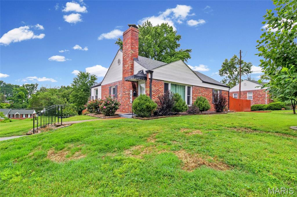 Welcome to Affton, and this move-in-ready brick home with 3 bedrooms and 2 full & modern baths is beautifully updated and maintained.  A large living room with a wood-burning fireplace, a huge picture window, and hardwood flooring is your entry.  The large dining room has hardwood floors and lots of natural light with a built-in china cabinet. There are 2 main bedrooms and a 3rd large bedroom in the lower level with its own bath.  The kitchen is updated with an electric range, an island for more storage, and newer appliances. There is also a large family room space with a separate entry. 
The lower level is finished with a recreation room, a full bath with a newer walk-in shower, subway tile, and glass shower doors. The updated high-energy HVAC system, energy-efficient water heater, and new electric panel. There is an attached one-car garage with a new insulated garage door & a Genie quiet opener. The flat corner lot and extra driveways for off-street parking make it easy to entertain the whole family. This home is located in a fantastic area with quick access to entertainment, highways, dining, and much more. Seller has priced the home to sell quickly.  This home is one block from Mackenzie park.