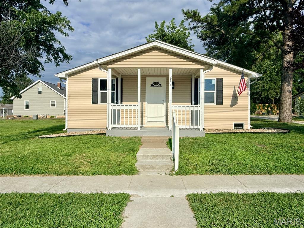 Cute as a button and completely remodeled from top to bottom! This charming 2-
bedroom, 1-bath home offers 784 square feet of thoughtfully updated living space and is
ready for its new owner to move right in. Nearly every aspect of the home has been
improved, including the roof, siding, windows, gutters, electrical, plumbing, drywall,
flooring, kitchen, and bath. The bright and inviting kitchen features fresh white cabinetry,
beautiful quartz countertops, and new stainless appliances including a stove,
dishwasher, and microwave. The stylish full bath offers a new vanity, a tub with tile
surround, and a soothing color palette that creates a calm and relaxing atmosphere.
With all living space conveniently situated on one level, this home is ideal for first-time
buyers, those looking to simplify, or anyone seeking low-maintenance living. Outside,
you'll find a one-car carport with an attached storage area that can also serve as a
covered patio for relaxing or entertaining. Situated on a small, level lot, the property
requires minimal upkeep, leaving you more time to enjoy your new home. Affordable,
updated, and move-in ready—this adorable home is one you won't want to miss!