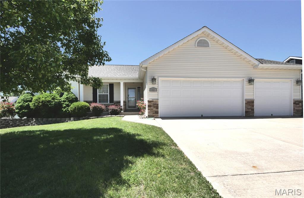 Come tour this exceptional 3-bedroom, 3 full bath Ranch with a 3-car garage in the beautiful Whitetail Crossing subdivision. Check out the nicely finished basement with a large 23x18 lower-level family room with ceramic tile flooring AND a sleeping room with closet located near the 3rd full bath here. Attractive wood flooring on the main level with new carpeting in the bedrooms. Great Room with vaulted ceiling has an electric fireplace and adjoins the Breakfast Room that leads to a shaded patio in the fenced year. Plenty of 42” tall kitchen cabinets and countertop space in the kitchen as well as a large pantry, main floor laundry room and access to the 3-car garage with opener. The refrigerator will stay. The Primary bedroom has full bath with double bowl vanity, jetted luxury bathtub and separate shower stall. The garage has a side door. New roof 2023 as well as new siding, screens, and gutters/downspouts; $30,036 cost, receipt available. Water Heater replaced about 8-10 years ago. 200-amp breaker box. Thermal tilt-clean windows. Attractive landscaping. Sidewalk in front of home.