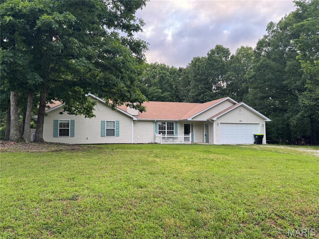 If you’ve been looking for a place near the lake that actually feels like home with NO HOA fees, this is it!
This 4 bed, 2 bath home sits on 0.52 acre lot and offers an open-concept layout with vaulted ceilings, abundant natural light, and a cozy stone fireplace that anchors the main living space. The kitchen flows seamlessly into the living and dining areas, featuring ample cabinetry, stainless appliances, and a functional breakfast bar, perfect for everyday living or hosting.
The spacious layout provides flexibility for full-time living, guests, or a dedicated office space. The primary suite includes a walk-in closet, while additional bedrooms offer room to grow.
Step outside to a fenced backyard, ideal for pets or relaxing evenings in a quiet, wooded setting.
Bonus opportunity: 10x28 Boat Slip is available for an additional $20,000 with an accepted contract. The adjoining 0.52-acre Lot 24 is available for an additional $25,000 with an accepted contract, giving you the chance to expand, build, or secure additional privacy.
Whether you're looking for a full-time residence, weekend getaway, or investment property near the lake, this one checks all the boxes.