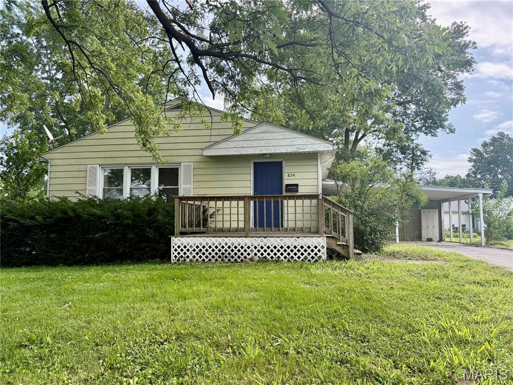 Welcome home to this charming bungalow conveniently located close to all the amenities of town! This home features 3 bedrooms and 1 full bathroom on the main level, along with a spacious kitchen where all appliances convey. Large front dining and living combo. All plumbing lines have been converted to pex. The partially finished basement offers additional living space with a comfortable family room and a non-conforming bedroom or office, providing flexibility to fit your needs. Outside, you’ll find a carport with a storage room and a nice backyard.