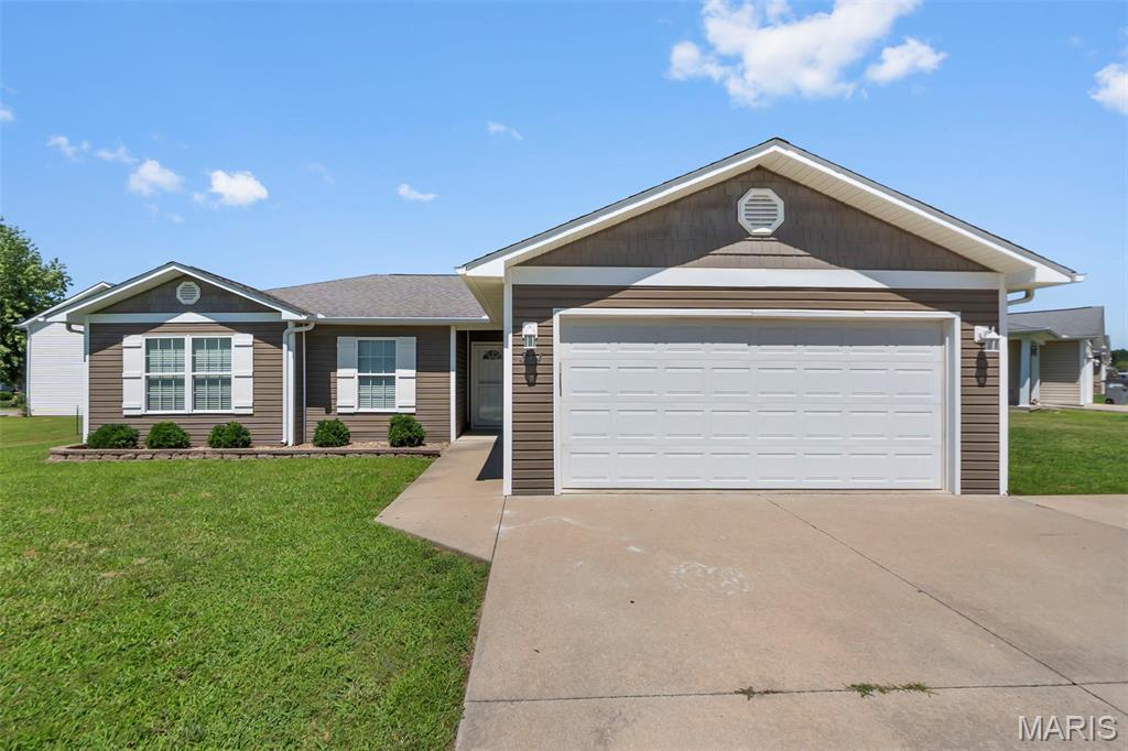 Single-level living, major updates already completed, and a location that keeps you connected to everything that matters. Built in 2010 and situated in the Fruitland area, this move-in-ready home offers easy accessibility and a thoughtfully designed floor plan. You'll appreciate being just minutes from I-55, Mondi, and Procter & Gamble, while also enjoying the ability to walk to North Elementary and nearby restaurants. The kitchen has been refreshed with quartz countertops, an updated sink, stylish backsplash, and additional pantry cabinetry. All large appliances are included. Fresh paint, updated fixtures and hardware, and 2" blinds throughout give the home a clean, updated feel from room to room. The primary suite offers a comfortable retreat with a spacious walk-in closet and an updated en suite bath featuring a modern walk-in shower. Two additional bedrooms and a refreshed hall bath provide flexibility for guests, family members, or a home office. Big-ticket improvements have already been addressed, including a brand-new high-efficiency Carrier HVAC system, premium Marathon water heater with a limited lifetime warranty, added blown-in insulation, storm doors, tilt-in gridded windows, and an upgraded garage door opener system with keypad access. Outside, the covered patio creates a comfortable space for morning coffee, evening relaxation, or entertaining guests, while the expanded third-car driveway provides valuable additional parking. If you've been searching for a home that combines convenience, accessibility, and meaningful updates in one package, this one is ready to deliver.