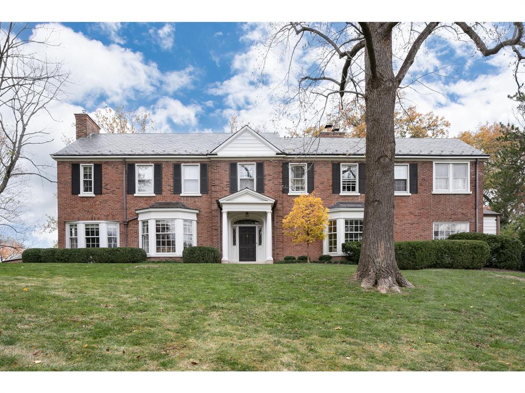 Step into timeless elegance in this Gale Henderson designed home, nestled in the heart of Ladue. Situated on a lush, private acre lot, this estate blends historic character with refined luxury. Graciously proportioned rooms, soaring ceilings, and vast windows flood the home with natural light, highlighting exquisite details like herringbone wood floors and intricate crown molding throughout.
Designed for both grand entertaining and comfortable daily living, the home offers 4 spacious bedrooms, 4 full bathrooms, and 2 half baths, along with convenient second-floor laundry. Enjoy formal and informal living spaces, all with an effortless flow to the outdoors. The large private brick patio and pool, create an unmatched setting for gatherings and serene relaxation. This rare architectural gem combines unmatched craftsmanship with privacy, beauty, and location.