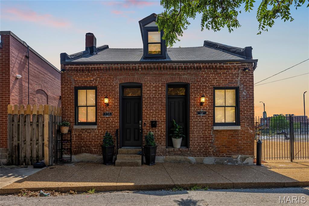 Open Sat, 7/18, 1-3pm. Welcome to 2106-10 S. 8th Street, a unique 3-bedroom, 2-bath home situated on a rare double lot in one of St. Louis’ most sought-after neighborhoods. This move-in-ready property offers gated off-street parking, a fenced backyard, and an ideal blend of historic character and modern updates.

The main level features tall ceilings, luxury vinyl plank flooring, recessed lighting throughout, a spacious open-concept living and dining area, and a convenient main-floor bedroom and full bath. The beautifully updated kitchen showcases soft-close white cabinetry, Black Pearl granite countertops, glass tile backsplash, stainless steel appliances, and contemporary chrome fixtures. Convenient Main-floor laundry.

Upstairs, you’ll find two generously sized bedrooms with walk-in closets and a stylish full bath. Additional storage is available in the lower level with durable concrete flooring.

Enjoy outdoor entertaining on the large exposed aggregate patio within the private fenced yard. Just steps from the best of Soulard, including restaurants, live music venues, coffee shops, grocery stores, parks, the French Dog Park, Soulard Farmers Market, and the Anheuser-Busch campus.

Don’t miss this opportunity to own an updated home with outdoor space and parking in Historic Soulard for $330,000!