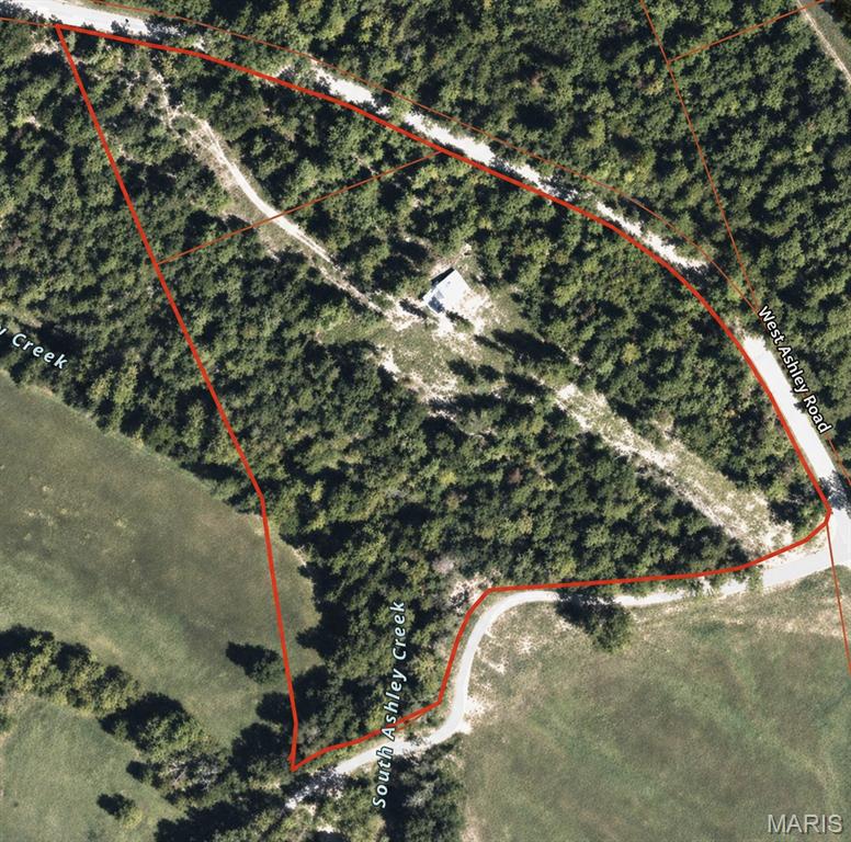 Explore the possibilities with this 9.23-acre parcel m/l in Raymondville. Offering county road frontage and an established driveway, this property provides convenient access while maintaining a peaceful, secluded setting.

The rolling, wooded landscape features mature trees, abundant wildlife, and a scenic creek flowing through the property. A cleared plateau offers beautiful views and an ideal spot for a future home, cabin, or recreational retreat.

Electric service has not yet been installed, but power lines run through the property for convenient connection. With no known restrictions, this land offers the flexibility to build, develop, or enjoy however you choose. Whether you’re looking for a homesite, hunting property, or weekend escape, this versatile tract is full of potential.