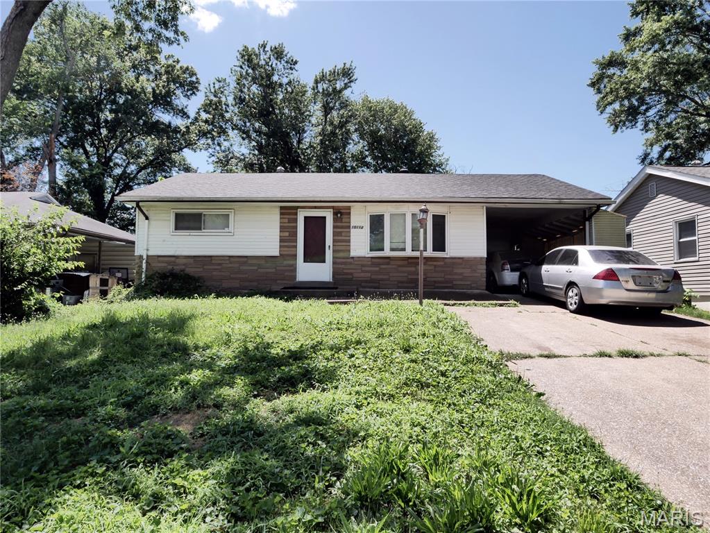 Attention investors, landlords. Here's a nice property to add to your portfolio. This 3BR, 2 Bath Ranch home is tenant occupied - lease is $1250 monthly. One year remains on the lease and the tenant would like to stay. The home has thermal tilt-clean windows; the 100amp breaker box has been updated, the roof appears to be newer and the home is sided. The basement is finished with knotty pine paneling, and the 2nd full bath is located here. One car carport and there's extra parking with the double driveway. Tax record shows the property to be 2 bedrooms, but in the 9x8 room with ceramic tile floor, there is a small closet behind the door. Property is being sold AS-IS - only FOUR DAYS allowed for buyer or buyer's contractors to visit after under contract for buyer inspections. No inspections nor repairs will be done by seller. Minimum $1000 earnest money. Please give 24-hour notice to view inside - don't disturb tenant without a confirmed appointment - must set appt the day before. St Louis County occupancy inspection has not been done but is not needed for occupancy as property is currently rented. Seller will not order occupancy inspection.