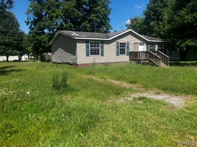 2005 modular home offering 3 bedrooms and 2 bathrooms with a spacious living room, kitchen, and dining area. The property also includes a 24' x 28' outbuilding, providing additional storage or workshop space. This property offers plenty of potential for a variety of uses.

All offers must be submitted through Propoffers.com. Buyers and buyer's agents should verify all information to their satisfaction. Property is being sold as-is.