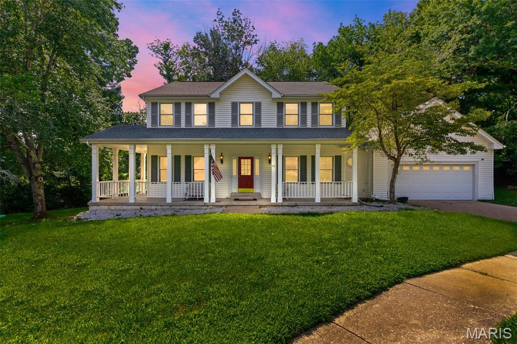 Tucked away on a peaceful cul-de-sac and situated on nearly half an acre, this beautifully maintained 4-bedroom, 3.5-bath home offers the perfect blend of space, comfort, and privacy.

From the moment you arrive, you'll be welcomed by the charming wraparound porch and mature wooded surroundings that create a peaceful retreat. Inside, a bright two-story foyer leads to an inviting floor plan featuring fresh, neutral finishes and abundant natural light. The formal dining room showcases elegant coffered ceilings, making it the perfect space for holiday gatherings and special occasions.

The spacious kitchen is designed for both everyday living and entertaining, offering a large center island, stainless steel appliances, double ovens, generous counter space, a walk-in pantry, and an adjoining breakfast area.

The cozy family room is the heart of the home, complete with a gas fireplace, custom built-in bookshelves, crown molding, and beautiful bay windows overlooking the private backyard.

Upstairs, escape to the expansive primary suite featuring dual walk-in closets, separate vanities, a relaxing soaking tub, and a separate shower. Three additional generously sized bedrooms provide plenty of space for family, guests, or a home office.

The partially finished lower level expands your living space with a large recreation area, a full bathroom, a sleeping room, and endless possibilities for a media room, gym, playroom, or entertaining.

Step outside to enjoy the oversized deck, ideal for summer barbecues or quiet evenings surrounded by nature. With a two-car garage, exceptional indoor and outdoor living spaces, and a desirable location, this home truly has everything you've been searching for.

Schedule your private showing today and experience all this incredible home has to offer!