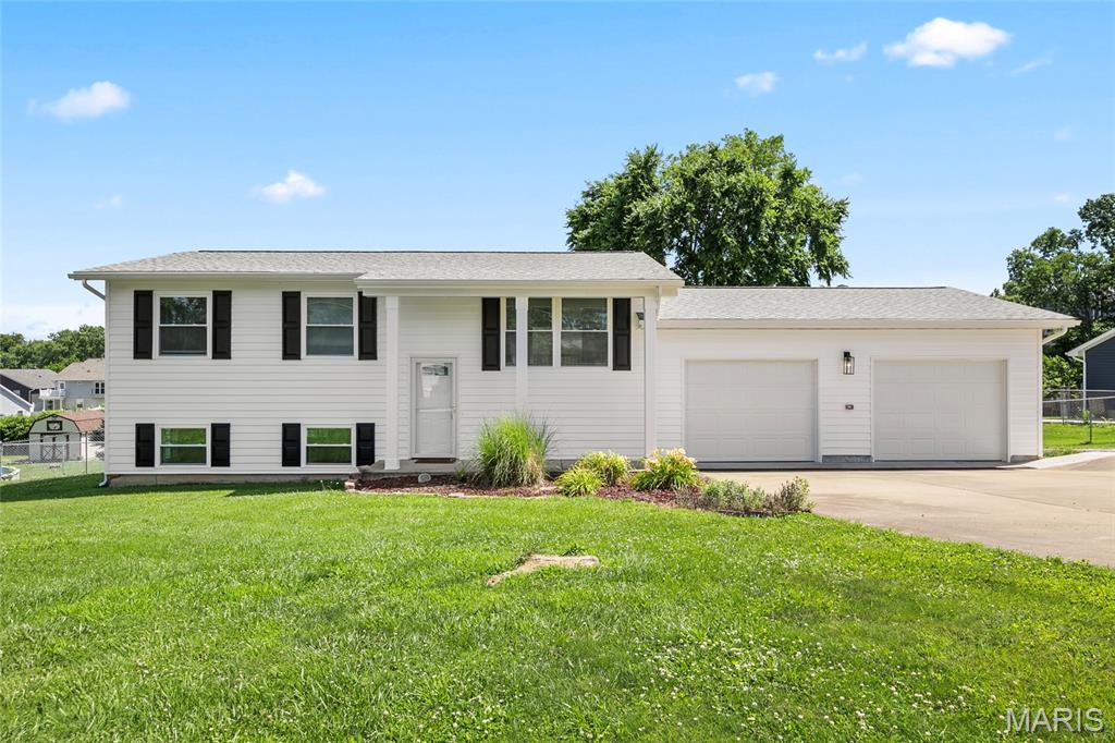 Completely rebuilt from top to bottom, this beautifully restored home offers the peace of mind that comes with modern construction while maintaining the charm of an established neighborhood. Following tornado damage, the home has been thoughtfully reconstructed with quality craftsmanship, creating a fresh, move-in-ready space for its next owner.

Situated on a spacious double lot, you'll enjoy plenty of room for outdoor entertaining, gardening, a workshop, or future expansion. An added bonus is that public sewer is available, offering flexibility for future improvements.

Whether you're looking for a like-new home with extra outdoor space or simply want the confidence of updated construction, this property is one you won't want to miss. Schedule your private showing today!