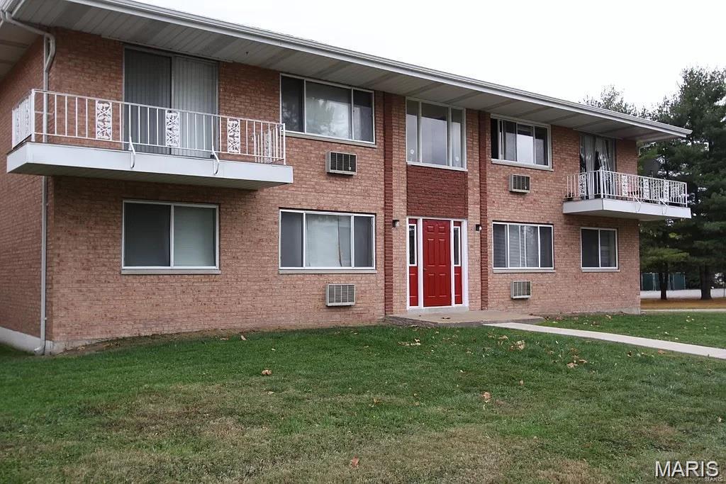 Exceptional turnkey investment opportunity with all four units fully occupied and updated for low-maintenance ownership. Each spacious unit features an open-concept layout with a living room, dining area, 2 bedrooms, and 1 full bath.  Residents enjoy a blend of hardwood, wood laminate, carpet, and tile flooring, along with in-unit laundry hookups, private storage spaces, and one reserved parking space per unit. Major capital improvements include a newer roof, newer condenser units, and three recently replaced furnaces, helping minimize future maintenance expenses. This well-maintained property offers strong rental appeal and consistent occupancy, making it an ideal addition to any investor's portfolio. Whether you're a seasoned investor or looking to expand your holdings, this income-producing asset provides immediate cash flow with minimal management demands. *Note: Electric panels are Federal Pacific. Parking lot is shared with neighboring buildings.*
