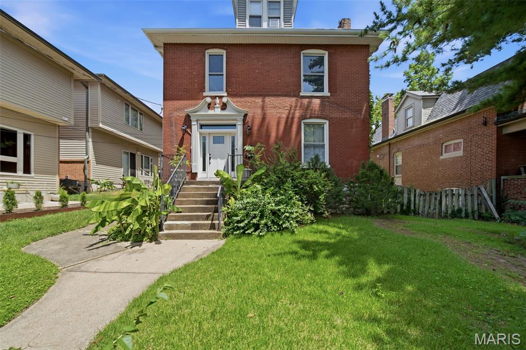 Nestled in the highly sought-after Dogtown neighborhood, this 2,370 sqft 2.5-story brick century home is brimming with timeless character and endless potential. Featuring 4 bedrooms, 2.5 baths, and filled with original architectural details, the home showcases beautiful hardwood floors, elegant arched doorways, and a striking original staircase with its classic stair railing. 

The main level offers a traditional layout with a spacious living room, dining room, and kitchen. Upstairs are three bedrooms, a full bath, and an office/flex space that could be converted to a 5th bedroom. A private bedroom suite complete with its own full bath is found on the 3rd floor.

The unfinished basement includes built-in shelving, a half bath, and a laundry area, offering abundant storage and workspace. Outside, enjoy a rear deck overlooking a private backyard, plus the rare convenience of a detached two-car garage and additional off-street parking.

While the property requires some renovation, it's solid brick construction, spacious layout, and abundance of historic charm provide the perfect canvas for a stunning transformation. Whether you’re an investor, rehabber, or buyer with a vision, this is an incredible opportunity to restore a historic home to its former glory. With its unbeatable location just minutes from Forest Park, Saint Louis Zoo, Missouri Botanical Garden, 1 block from Franz Park, popular Dogtown restaurants, and convenient access to Interstate 40 and Interstate 44, this is a rare opportunity to invest in one of St. Louis' most desirable neighborhoods. Bring your vision and transform this historic treasure into something truly special.