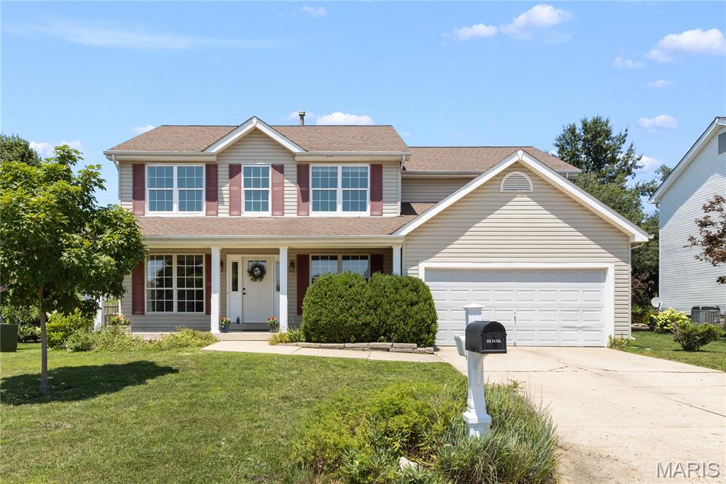 SPACIOUS 5-BEDROOM, 2.5-bath home in the highly sought-after TWIN CHIMNEYS subdivision! From the inviting front porch, to the peaceful, FULLY FENCED BACKYARD, this home is ready for its next chapter. Inside, you'll find HARDWOOD FLOORS and a traditional floor plan with a dining room and a living room flanking a welcoming foyer. On to the family room where the focal point is a wood-burning FIREPLACE for those cold winter days. This well-loved home offers plenty of space for entertaining and everyday living. The kitchen and breakfast nook feature a custom-built table with drawers for storage on one end, newer stainless steel appliances, white cabinets, a tile backsplash, a pantry, and loads of natural light. Off the kitchen, there is easy access to a main floor laundry and a two-car garage. French doors off the breakfast nook lead to a BACKYARD DECK with built-in benches making outdoor entertaining a breeze. Perennials dot the landscape offering beautiful blooms all spring and summer. Upstairs, retreat to the generously sized primary suite  with a LARGE WALK-IN CLOSET and a private ensuite featuring double vanities, a soaking tub, and a separate shower. Another four very comfortably sized bedrooms and a full bathroom complete the upstairs. With five bedrooms, there's room for everyone and lots of flexible use—whether you need space for guests, a home office, or hobbies. The FINISHED LOWER LEVEL recreation room provides additional living space ideal for movie nights, a playroom, home gym, or game room. The unfinished portion of the lower level provides ample room for storage and a work bench. Located in the desirable Twin Chimneys community, residents enjoy outstanding neighborhood amenities including 3 subdivision pools, tennis and pickleball courts, walking trails, playgrounds, and community events throughout the year. Conveniently located near shopping, dining, and parks. Easy commuting with nearby access to hwys 364 and 40/61. Within the highly graded FORT ZUMWALT SCHOOL DIST. with TWIN CHIMNEYS ELEMENTARY SCHOOL. This home offers the perfect combination of comfort, community, and convenience. Don't miss your opportunity to make this Twin Chimneys gem your own!