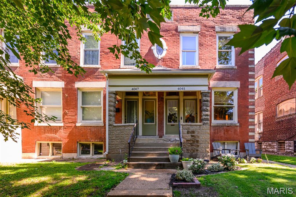 OPEN Sat. 6/20 12-2pm.  Nestled in the heart of the highly sought-after Historic Shaw Neighborhood, this charming 2-story townhome offers over 1,800 square feet of light-filled living space with 2 bedrooms and 1.5 bathrooms. Filled with character and warmth, the adorable interior blends historic charm with thoughtful updates, creating a home that's both inviting and functional. The main level features a flexible open floor plan with 1/2 bath and a spacious kitchen with white cabinetry, a center island, and stainless steel appliances. Upstairs, you'll find two generously sized bedrooms with ample closet space, including one with a charming attached office/workspace, along with a full bathroom. Extend your living space outdoors with both upper and lower decks, plus the added benefit of off-street parking. Just steps from amazing bagels, Food Truck Fridays, the Missouri Botanical Garden, the Tower Grove Farmers' Market, and all the dining and entertainment along South Grand. You'll love having the best of city living at your doorstep. Nearby Tower Grove Park offers festivals, concerts, sports courts, walking paths, and year-round community events. Shaw is one of St. Louis' most desirable neighborhoods, known for its beautiful historic homes, tree-lined streets, walkability, and strong sense of community. This is a wonderful opportunity to enjoy an unbeatable lifestyle in one of the city's most beloved neighborhoods.