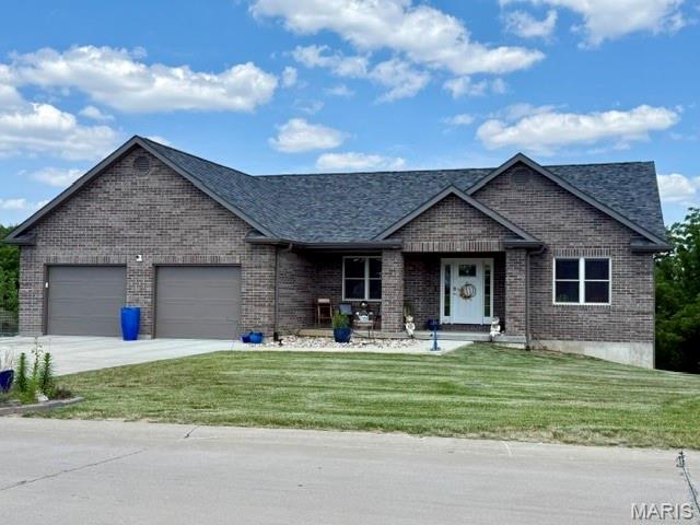 Welcome to your next home at 132 Gala Dr. where sophisticated design meets
everyday comfort in one of Hannibal’s most prestigious neighborhoods. Thoughtfully
crafted in 2023, this exceptional, custom home boasts almost 3,100 square feet of
finished living spaces seamlessly blending elegant finishes with modern functionality.
Just minutes from historic downtown Hannibal with its festivals, quaint shops, upscale
and local dining, schools, country clubs, churches and a regional healthcare system,
you’re in the heart of everything and yet able to enjoy privacy and country-like living.
Conveniently located near major urban centers like St. Louis and Kansas City, not to
mention Mark Twain Lake and the Lake of the Ozarks, you can enjoy a terrific small-
town vibe with convenient access to big-city and water-related attractions.
Entering this stunning home, you are greeted by soaring ceilings, rich architectural
details and an abundance of natural light that highlights the home’s inviting, open
concept design. The expansive Great Room serves as the heart of the first level, flowing
effortlessly into a beautifully appointed chef’s kitchen featuring premium finishes, quartz
counters, generous workspaces and an oversized island designed for gathering family
and friends. The open concept design provides ample space for a large dining table,
hutch and China cabinet. Additionally, the space features an informal, cozy dining space
for intimate family gatherings.
Moving on, you will find an elegantly designed, large Primary Suite, featuring a
generous 5-piece en-suite with dual sinks, large tile shower, soaking tub and oversized
walk-in closet.
Two spacious bedrooms, a guest bath and Laundry Room with ample storage, newer
washer and dryer, soaking sink and garage access, complete the main level.
Moving to the professionally finished lower level, you will find a huge family room, an
enormous bedroom/theatre room, generous 2 nd bedroom, full bath and storage room
that includes another, fully equipped laundry area, saving steps and time. These spaces
are perfect for guests, recreation, a home office, fitness area or multi-generational living.
This level also includes a convenient third garage perfect for storing lawnmowers, weed
eaters and other items.

Designed by an award-winning gardener, the outside landscaping features seasonal
blooms, a fire pit and mature trees surrounding the property on two sides, creating a
peaceful, private setting rarely found in newer construction. Whether enjoying a quiet
morning coffee or hosting summer evenings outdoors, these spaces offer a true
extension of the home’s luxury lifestyle. An upper-level covered deck with composite, no
maintenance flooring and a lower-level patio, also covered, provide more-than-adequate
spaces for enjoying the outdoors.
More than simply a beautiful home, 132 Gala Dr. offers a lifestyle defined by quality,
comfort and timeless elegance. Opportunities to own a custom home of this
caliber in Hannibal are rare. Experience for yourself the craftsmanship, attention to
detail and elegant living that this remarkable property offers. Schedule your private
showing soon to discover for yourself why 132 Gala Dr. is truly one of Hannibal’s
premier residences.