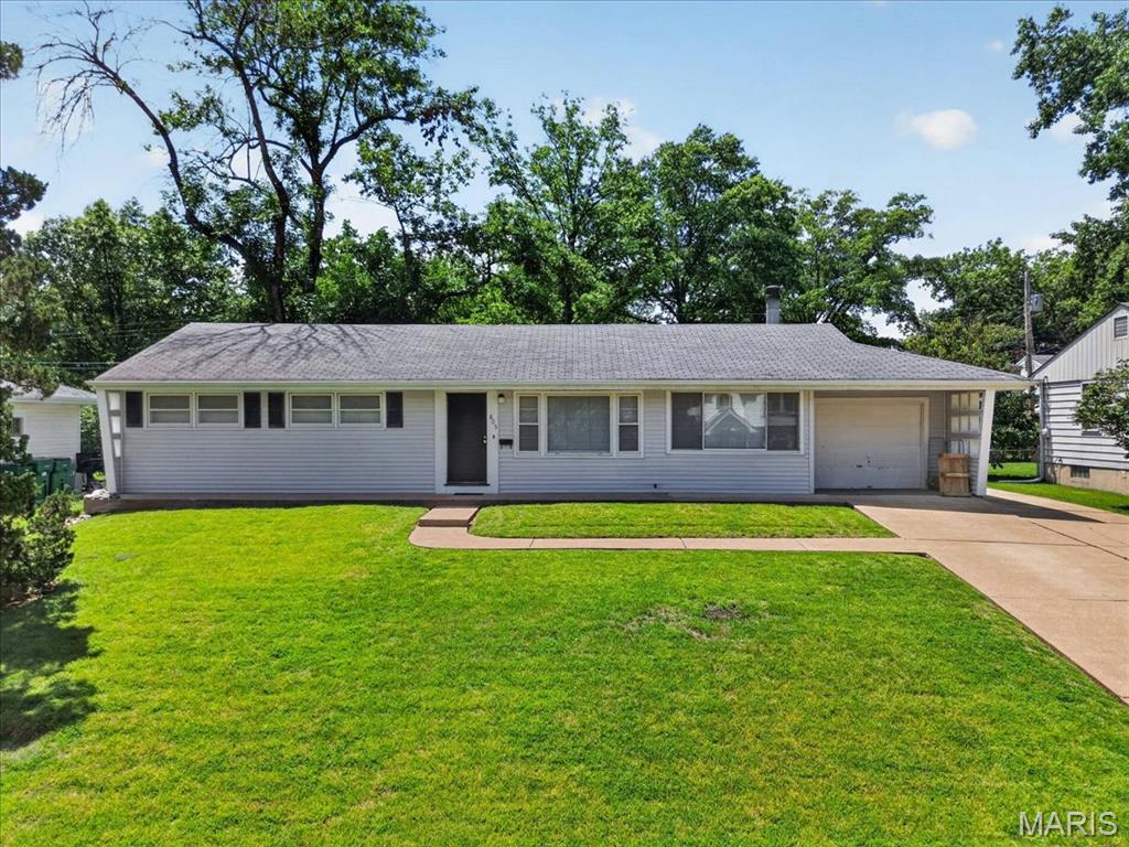 Opportunity awaits in this 1949 mid-century ranch located in the highly desirable Webster Groves community. Ideal for investors, renovators, or buyers looking to build sweat equity, this home is being sold as-is, with the seller providing no repairs, inspections, or warranties. Inside, you’ll find beautiful red oak hardwood flooring in two of the three bedrooms, an updated electrical panel, a 2-year-old 50-gallon water heater, and a breezeway addition that expands the living space. The converted breezeway, made into a family room features a cozy wood-burning fireplace, entry door from the driveway and sliding glass doors leading to the deck and fully fenced backyard. Additional exterior features include a one-car garage, an extended driveway parking pad, and a storage shed for added convenience. Enjoy the peaceful setting with mature trees, abundant wildlife, and a quiet neighborhood atmosphere while remaining just minutes from an impressive array of community amenities. Conveniently located near Blackburn Park, Memorial Field, the Webster Groves Recreation Complex, Fitness Center, newly rebuilt Aquatic Center, tennis and pickleball courts, ice skating rink, and Webster University. Whether you’re seeking your next investment project or an opportunity to create your dream home, this property offers exceptional potential in one of St. Louis County’s most sought-after communities.