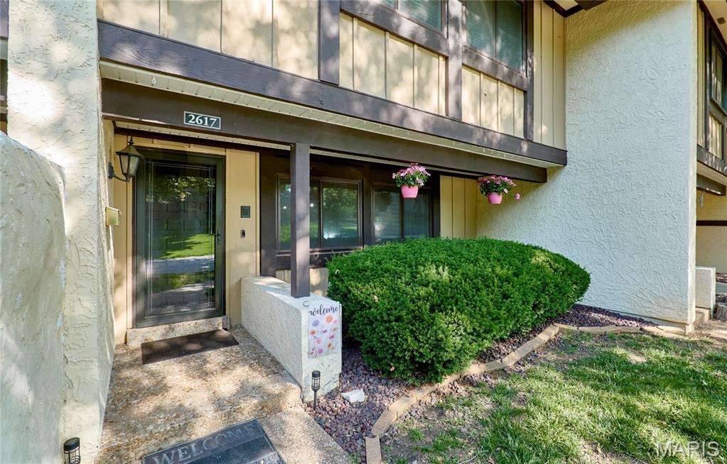 Looking for low a maintenance condo with plenty of space at a great price! Look no further. Condo amenities include lawn maintenance, snow removal and trash service as well as some exterior insurance; LOWERING YOUR OVERALL COST. Enjoy easy living in this 1700+ sq ft open concept condo with 3 spacious bedrooms, 3 bathrooms, living room, dining room, hearth room, main floor laundry  & loft. The main level includes a large living room to accommodate all of your entertainment needs. The kitchen offers a convenient workspace with center island, wood cabinetry and pantry for plenty of storage along with stainless appliances.  You can enjoy meals in a separate dining area with updated lighting.  Spend evenings in the adjacent cozy Hearth room with masonry fireplace or walk out to your patio with privacy fence on 2 sides and beautiful wooded area beyond.  A main floor laundry adds convenience to laundry day; no more running up and down to do laundry. An updated powder room completes this level.  Walk up the open stairs to the versatile loft with skylight for natural lighting.  So many possibilities for this flex area! It could be used as an office, playroom, entertainment room, studio or whatever you can imagine. A coffee bar or whatever kind of bar you desire adds to the possibilities. 
The sizeable primary suite has ample space for a king bed and additional furniture as well as a walk-in closet.  Enjoy peaceful views of the nearby woods from the private balcony.  The spa-like primary ensuite bath offers a private retreat space with double vanities, large soaking tub and shower.   An additional full bath and two nice sized bedrooms complete the upper level. Vinyl plank, vinyl and ceramic tile flooring throughout is so easy to keep clean. Imagine your free time with no more grass cutting, lawn maintenance or snow removal!  Easy access to Highway 364, 40 and 70 makes dining, shopping and commuting a breeze.