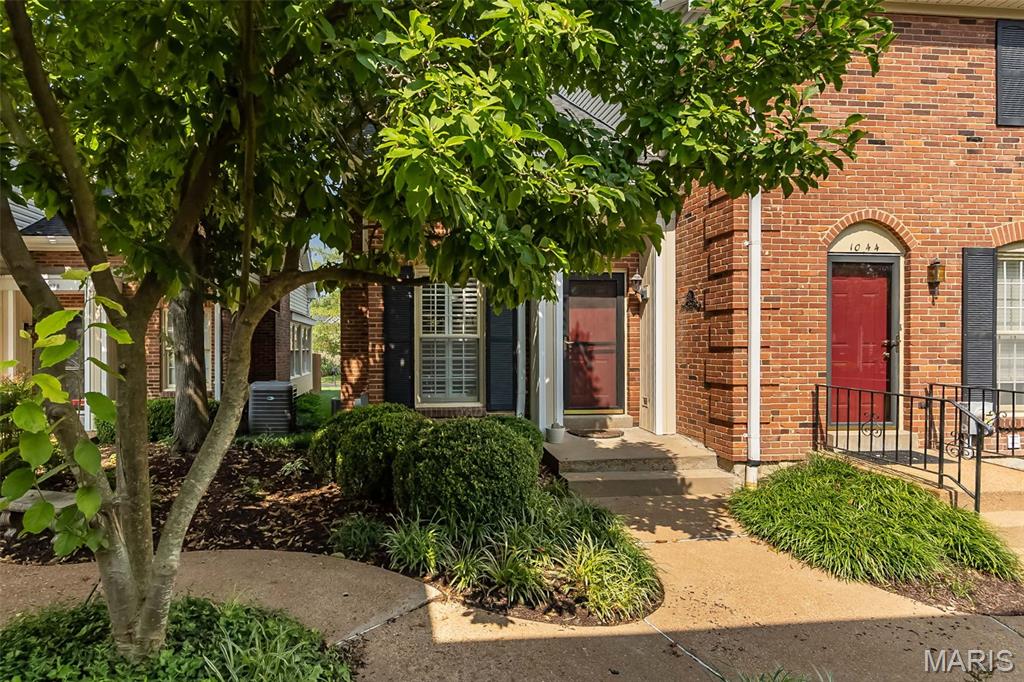 Enjoy low-maintenance living in this spacious Kirkwood townhome offering more than 1,800 square feet of flexible living and entertaining space. The bright, open floor plan welcomes you with an entry foyer and convenient coat closet. The spacious living room features a gas fireplace and an adjoining area that can serve as a dining room, home office, or additional sitting space. The large eat-in kitchen offers abundant white cabinetry, glass-front display cabinets, and ample room for everyday dining. All kitchen appliances are included. An updated half bath and utility closet complete the main level. Upstairs, the primary bedroom features a 5-by-5-foot walk-in closet. The second bedroom includes two double-width closets, and a spacious full bath serves the upper level. The partially finished lower level provides additional living space with a family room, storage room, and laundry area with a utility sink. Additional highlights include custom plantation shutters throughout the main level, a new water heater, and new flooring on all three levels. The condominium association has also recently replaced the roof and siding. Ideally located near highways, shopping, dining, and the many amenities of downtown Kirkwood.