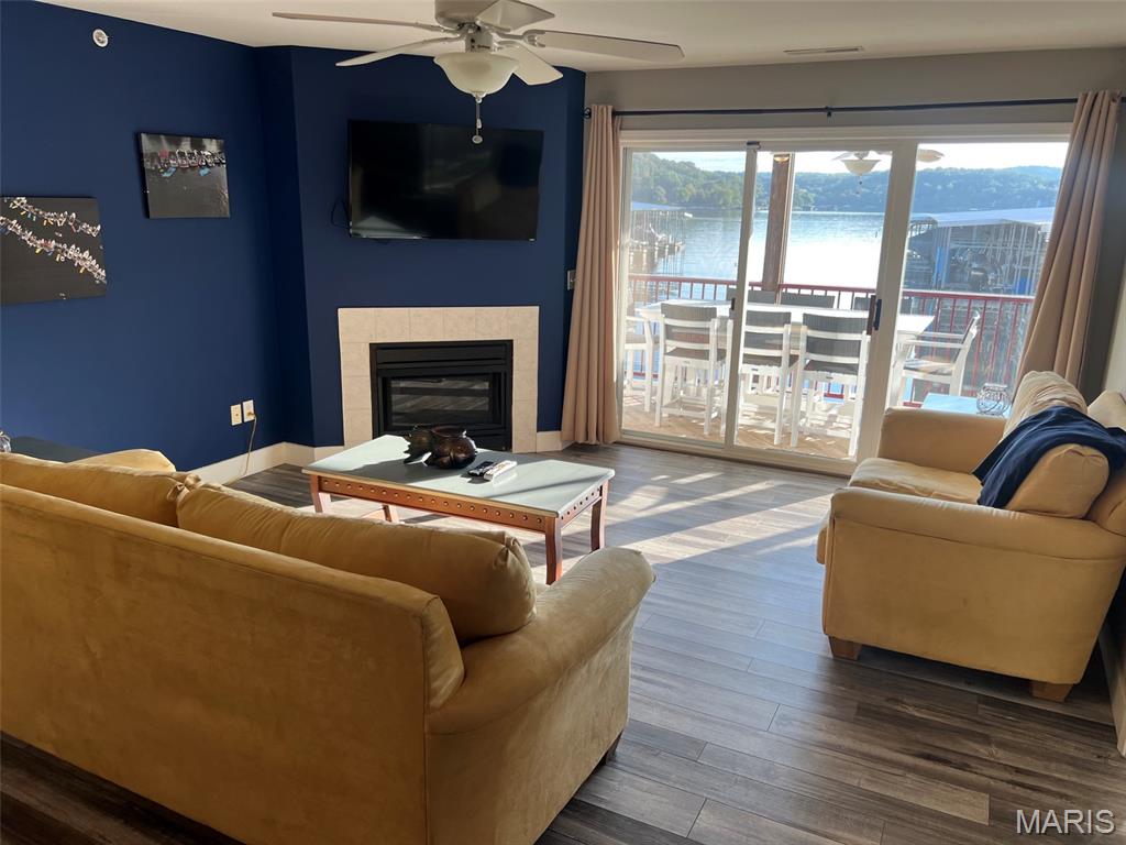 Located in the highly sought-after Clearwater Condominiums (Camdenton area) at the Lake of the Ozarks, this beautifully updated 2-bedroom, 2 full bath lakefront condo offers one of the best locations in the entire community. Situated on the ground floor, you’ll enjoy unmatched convenience with direct walk-out access to the lake, docks, pool, and your boat slip - all just steps from your oversized lakeside deck.
This move-in-ready condo has been new flooring throughout. Additional upgrades include a newer high-efficiency HVAC system.
What truly makes this property unique is that this is one of the ONLY 2 condo in the entire Clearwater community connected to the adjoining unit by both an interior door and exterior deck access. When purchased together with the neighboring condo, this creates an incredible 5-bedroom, 4-bath lakefront retreat featuring two kitchens, two living rooms, and an expanded double-sized deck - perfect for large families, entertaining, or investment potential as you can rent them out together or seperately.
This unit can be seperated by locking the demising doors and renting out the other side for great investment returns.
Included with the property is an double PWC slip and the neighboring condo 3bed/3bath includes a 40 foot boat slip. (one of only six 40-foot slips available in Docks A–H). Large slips like this are nearly impossible to find in Clearwater.
Clearwater is known as one of the premier condo communities at the Lake of the Ozarks, offering outstanding amenities, beautiful grounds, excellent lake access, and a fantastic atmosphere for full-time living or vacationing.
A rare opportunity to own a truly one-of-a-kind lakefront property in the heart of the Lake of the Ozarks.