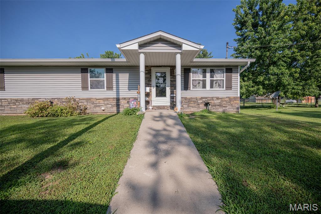 Welcome home to this spacious 4-bedroom, 2-bath home offering comfort, functionality, and plenty of room to enjoy both inside and out. Situated on a desirable corner lot, this property features a large fenced backyard that's perfect for kids, pets, entertaining, or simply relaxing. A covered patio provides the ideal spot to enjoy your morning coffee or unwind in the evenings. Inside, you'll appreciate the wide hallway that creates an open, welcoming feel throughout the home. The functional layout includes a convenient main-level laundry room, making everyday living a breeze. The detached shop/garage offers two parking spaces along with plenty of room for storage, hobbies, or a workshop.
With its spacious living areas, outdoor amenities, and versatile spaces, this home is ready for its next owners to make it their own.