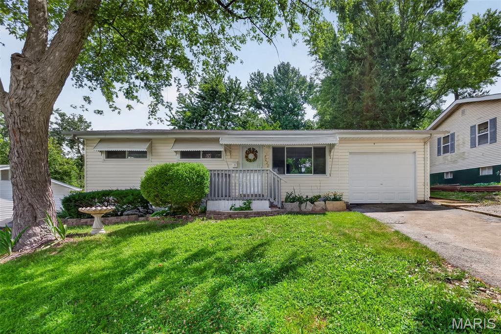 This lovely, refreshed home is a must-see for anyone looking for the benefits of home ownership at a great price. New items include HVAC system, electrical box and outside mast, garage door (with opener), kitchen appliances, garbage disposal, interior paint, front storm door, refinished hardwood, bedroom carpet, light fixtures, and faucets. You will also get a partially finished basement perfect for entertaining or just relaxing and a wonderful, covered patio in back with a ceiling fan/light so that you can enjoy the beautiful, fenced backyard any time of the day or evening. One car garage and driveway with extended parking allows space for plenty of guest parking. Quiet neighborhood in a convenient north-central location of unincorporated St. Louis County with easy access to highways, airport, and metro. Close to Ramona Lake Park, as well as many large employers and the University of Missouri - St. Louis. Agent owned home. Buyers should independently confirm school boundaries.