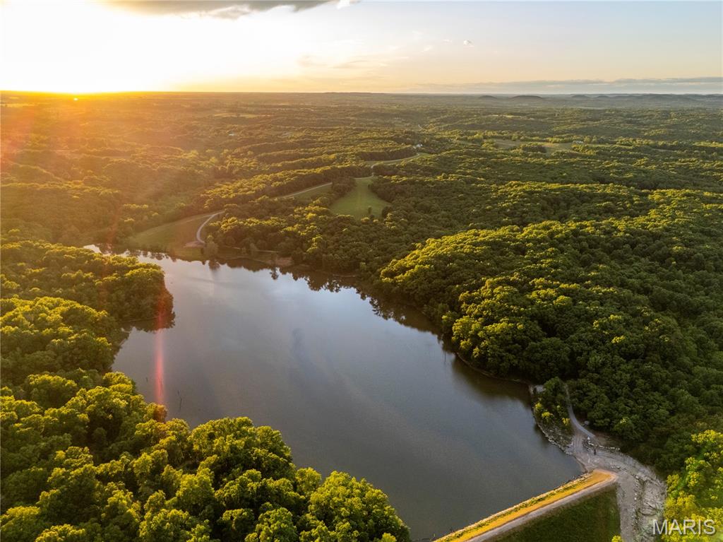 Phenomenal hunting & fishing property located in Northern Lincoln County! This 140 acre tract features a beautiful 25± acre stocked lake situated at the end of a dead end private drive secluded by hardwood timber. The property is mostly wooded with a good mix of switch grass and potential food plots. Multiple good building sites with views of the surrounding landscape or build near the lake. The farm is located in an area known to produce big bucks and gobbling turkeys. Large land holdings as neighboring tracts. Established trail system to access the property. Very rare to find a recreational tract that offers a lake of this size!!