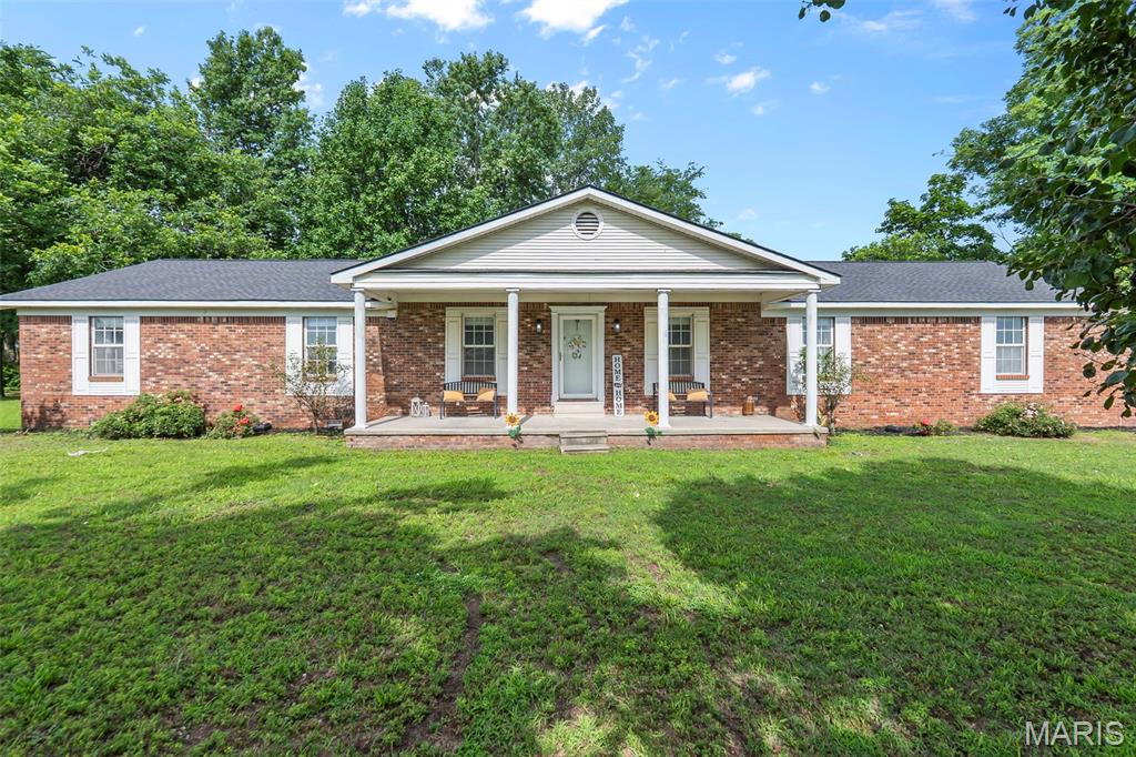 Situated on 2.2 secluded acres in Steele, MO, this 4-bedroom, 3-bath ranch home offers privacy, space, and comfort. Inside, you'll find a beautifully remodeled kitchen and updated bathrooms, creating a fresh and modern feel throughout. The functional floor plan provides plenty of space for everyday living and entertaining. Outside, enjoy the peace and quiet of country living with over 2 acres to call your own, plus a detached shop that's perfect for hobbies, storage, or workspace needs. Complete with a 2-car garage AND Storm Shelter, this property offers the space, privacy, and versatility you've been looking for.