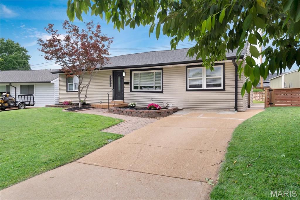 Welcome to 5463 Tedmar Court. This renovated gem, nestled in a quiet cul-de-sac, yet a few minutes walk to Lindenwood and Tilles parks has something for everyone and is made for entertaining! Walk into this giant living room, with a vaulted ceiling, then into the huge kitchen with tons of cabinet and storage space. You will never run out of room! Moving out of the back door, find yourself in a lovely fenced in back yard with an enormous, covered deck that has to be seen to me believed!  Inside, find a fully renovated bathroom, an extra large master bedroom with huge walk-in closet and a second bedroom that is well sized with a generous closet, rounding out the main floor.  The basement finished area includes a full bathroom and large family/game/hobby/bonus room so everyone has a space to call their own. Freshly painted in cool neutrals and with new flooring throughout the main floor and finished basement area, this home is move-in ready! Enjoy all of this and peace of mind.  The house had some settling and the seller had the house piered with a transferable warranty and a new architectural shingle roof installed! The HVAC system was installed in 2020 and the Rheem Tankless water heater was installed in 2015!  Come on in, take a look and fall in love!