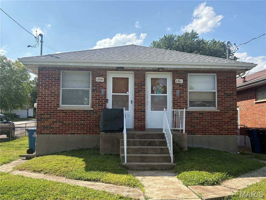 Great Investment Opportunity! 1311 & 1313 Wachtel is a Duplex with one side featuring 1 bedroom & 1 bath upstairs with a partially finished basement with a full bath and the other side has one bedroom and one bath. Each unit has its own entrance, basement access and a shared backyard. There is a detached 2 car garage and 2 parking spaces on the street.  Property is being sold in its current as is condition and seller to do no repairs or inspections. Inspections are for buyer's information only.