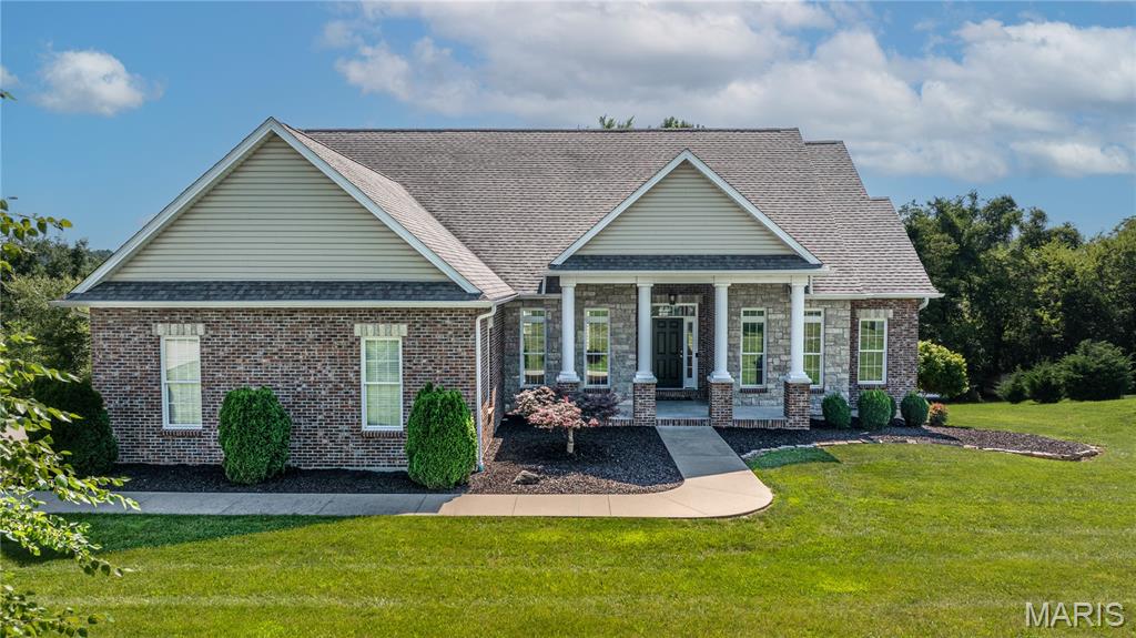 Stunning 5-bedroom home at the end of a cul-de-sac. Offering so much space! The main floor has a formal dining room, office, breakfast area with the highlight being a dramatic two-story living room with a gas fireplace and wood floors. The kitchen is a great functional space with granite countertops, stainless steel appliances and a breakfast bar overlooking the eating area showing off lots of light and windows. Expansive main floor primary suite with en suite bath. Also on the main floor are 2 other bedrooms with a jack-n-jill bath. Great size mudroom and separate laundry room right off the garage.  While upstairs you’ll find an additional large suite with separate HVAC and a private bath. The finished basement adds an additional bedroom, full bath and a large family/recreation room, plus a john deere room. Outside is your very own Sports Court - so unique! Perfectly set up for basketball, pickleball or any kind of fun outdoor activity! For more info on the Sports Court: www.sportscourt.com. Great curb appeal, low traffic street and the inside all freshly painted -  we can accommodate a quick closing, this one is ready for you - move right in!