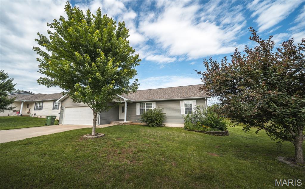 Well-maintained 3-bedroom, 2-bath ranch home in a convenient location! This low-maintenance property features an open floor plan with vaulted ceilings, creating a spacious and inviting atmosphere. The primary suite offers privacy and comfort, while the split-bedroom layout is ideal for families or guests. Enjoy the convenience of a 2-car garage and easy access to shopping, parks, dining, and all the amenities of town. Move-in ready and waiting for its next owner!