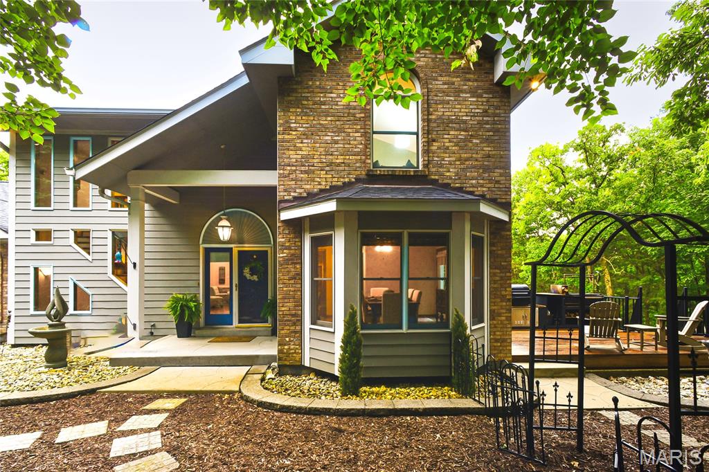 Move-in ready and beautifully maintained. 3-bedroom, 3-bath, 1.5-story home that sits on 4.53± private acres with wooded views and private trails leading to a public trail along the Meramec just down the hill. Enjoy the perfect balance of comfort, privacy and low-maintenance living with nearly 3,000 square feet of living space and scenic wooded surroundings. Spacious living areas, a fireplace, attached 2-car oversized garage and peaceful views from every window make this home a true retreat. Modernized kitchen, spa-like bathrooms and newer solid surface flooring. Experience the serenity of acreage living while remaining just minutes from shopping, dining and top-rated Rockwood schools.