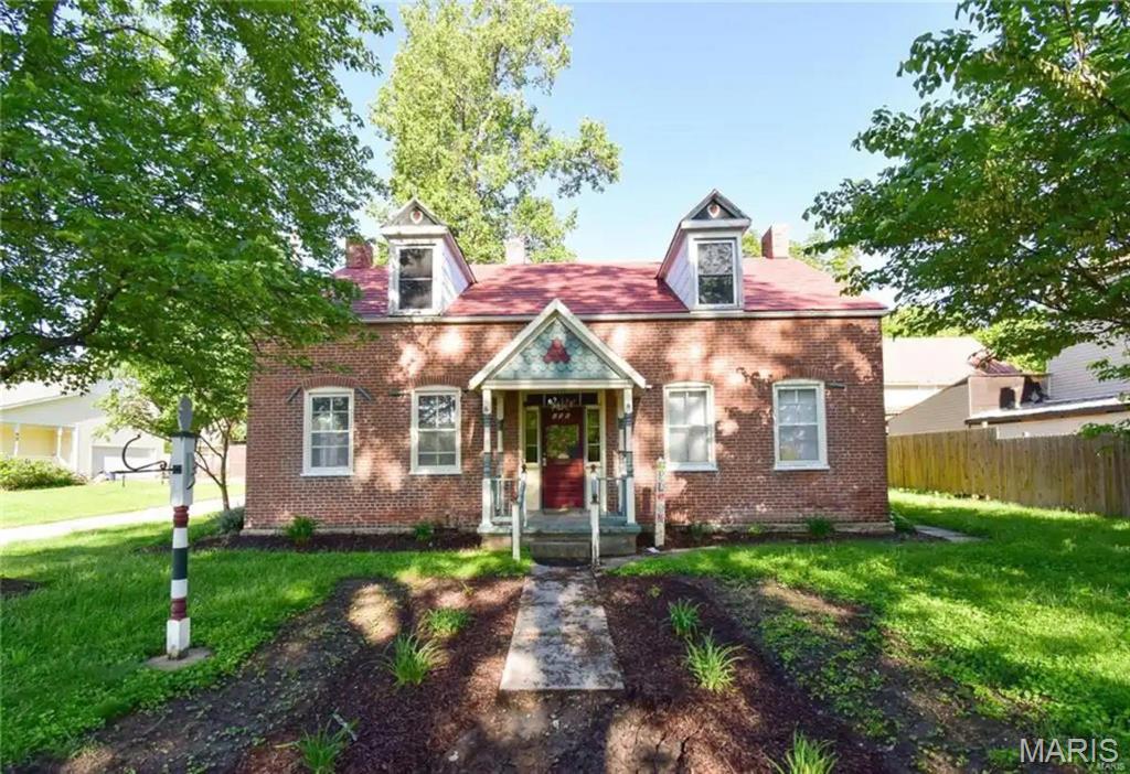 The Bloom House and Bloom Suite is located within walking distance to beautiful Historic Downtown Hermann. It is one of Hermann's premier Guest House experiences. A splendid, fully restored historic brick Cape Cod style home with a newly built in 2023 open concept one bedroom suite attached to the rear of the home with off street parking. Zoned R2 with grandfathered use as a guesthouse vacation rental for a great business opportunity. Everything is included with this sale, interior and exterior, to make it a truly turnkey property! Future bookings will be transferred to new owner at closing. Guests love their stays here along with all the character & attention to detail it exudes from the wood floors, historic millwork, spacious rooms, 9' ceilings, a grand staircase with beautiful wood banister & back patio. The Bloom House boasts 4 big bedrooms, 2 full baths with an equipped kitchen & living area! The Bloom Suite offers a bed, mini kitchen and a full bath! GREAT LOCATION! A MUST SEE!