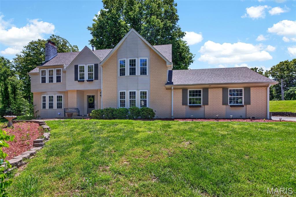 This Wonderful Wildwood 4 bedroom, 4 full & 1 half bath home has over 3500 square feet of living space. It is located on a secluded lot, with a long, private driveway. Over 3 gorgeous acres, about half wooded and half level ground. A crystal clear blue pool also enjoys privacy from any neighbors view.  The main floor has several large gathering spaces, a half bath too. Stainless appliances and granite counters grace the chef’s kitchen. Near the back door is a full bath and laundry room, very convenient to the pool area. Upstairs, a large primary bedroom has a fireplace and an updated ensuite bath. 3 more generously sized bedrooms and a full bath complete this floor. The walk-out lower level has had significant renovations done. New waterproofing system (with transferable warranty), sump pit with pump and new flooring in April 2026.  Roof and Gutters were replaced in October 2025. HVAC is only 10 years old. An oversized garage has room for all your extra lawn and pool equipment!  Located in the award winning Rockwood School District, it is just minutes to Lafayette High School. This beautiful homestead feels miles away, but is close to shopping and entertainment. This home is priced to move knowing that buyers may need to update carpeting and apply fresh paint in a few areas.  This home just got easier to buy!! Seller to credit Buyer up to $5000 to buy down points.