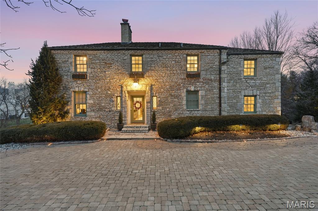 This stunning French Provincial–style residence more like a retreat was designed by acclaimed architect Gale E. Henderson, offers timeless elegance and exceptional livability on a 1.14-acre flat, tree-lined lot. With over 4,200 square feet of light-filled living space, the home features four bedrooms and three-and-a-half baths, thoughtfully designed for both relaxation and entertaining. Curly maple hardwood floors from Kentucky grace the main living areas, complemented by newly completed custom built-in shelves and bookcases and three fireplaces that add warmth and character throughout. The home is enhanced by newer Marvin windows and doors, custom window treatments in every room, and a seamless blend of classic design and modern comfort. Outdoor living is equally inviting with two newer decks, a newer stone driveway, and a serene setting surrounded by mature trees. Plush carpeting in the bedrooms provides comfort and privacy, while the home’s gracious layout creates an atmosphere ideal for gatherings large or small. This is a rare opportunity to own a beautifully crafted home where architectural distinction meets everyday luxury.