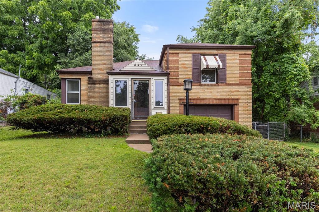 Welcome to 833 Margo Ave.! This well-maintained brick Ferguson home offers more space than meets the eye. Features include hardwood floors, a spacious living and dining area with a wood burning fireplace, a bright breakfast room overlooking the fenced backyard, and two generously sized bedrooms. The attached garage provides ample storage, while the basement includes a sump pit and additional storage or future living space potential. Conveniently located near Hwy 170 and within walking distance of local schools, this property is a great opportunity for homeowners and investors alike.