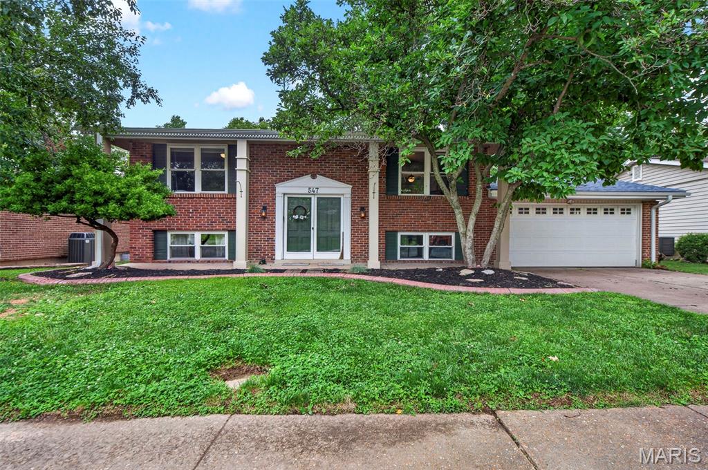 Welcome home to this well-maintained 3-bedroom, 2-bath home in the sought-after Rockwood School District! This move-in-ready home features LVP flooring throughout both levels, stainless steel appliances, a new water heater (2026) The roof, gutters, furnace, A/C, washer, dryer, garbage disposal and refrigerator are newer. Enjoy the freshly painted deck overlooking the beautiful flat, fenced backyard; it's perfect for entertaining or relaxing. Conveniently located near shopping, dining, and parks. A washer, dryer, Ring doorbell, and refrigerator (as-is) are to stay. Don't miss this wonderful Ballwin opportunity!
