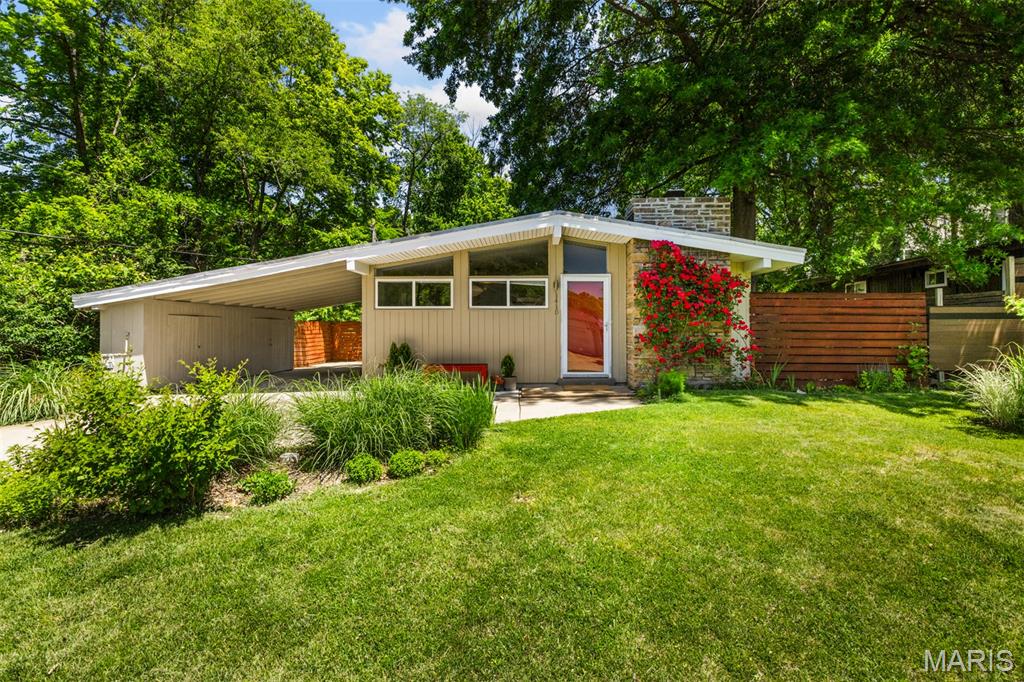 Wonderful Ralph Fournier designed mid-century home in the Ridgewood neighborhood.  Set on a large, level lot in the middle of the neighborhood enjoy the vaulted ceilings, open floor plan, gorgeous original wood detail, low slung roof, clerestory windows & massive amounts of natural light.  Many nice updates over the years include bamboo floors, bright white kitchen, stainless steel appliances, horizontal fencing and a brand new patio area off the living room.  Out back are amazing raised planters with irrigation - perfect for growing loads of vegetables.
Located in the Lindbergh school district and so close to all the new stores and restaurants in Crestwood.