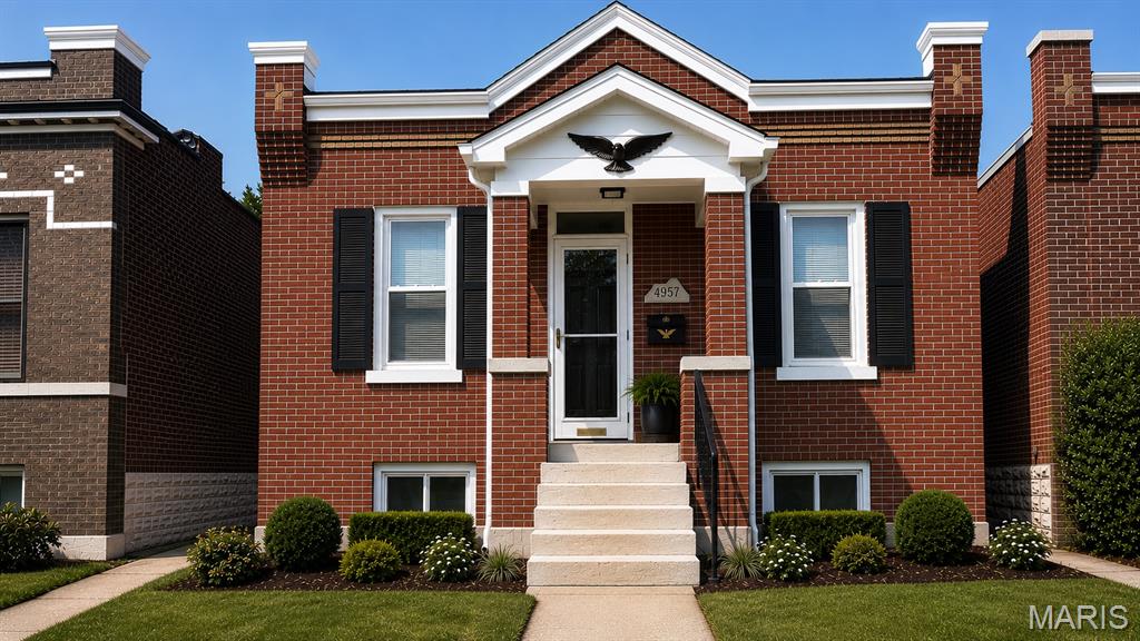 Brick Cottage newly remodeled...New HVAC, New wiring, New Plumbing, New roof, updated Bathroom with Marble surround, Updated Kitchen with Stainless Steel Appliances, Dishwasher, Gas Range, Refrigerator, Microwave and 42 in custom cabinets...Eat-in..2 Nice size Bedrooms.  Plenty of Closet space...Walk-up basement with laundry facilities.  Walk out of the kitchen to a new deck overlooking the privacy fenced yard...  Oversized 2 car garage with new roof and workshop area.
Move-in Ready....