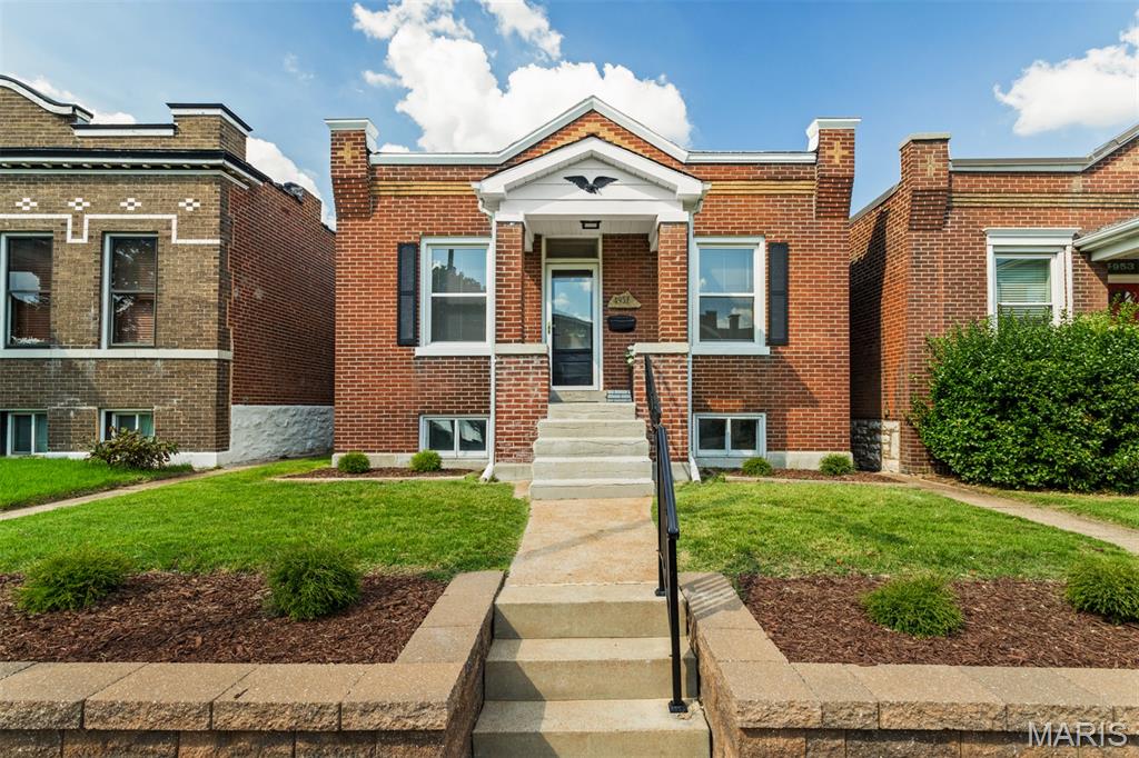 Brick Cottage newly remodeled...New HVAC, New wiring, New Plumbing, New roof, updated Bathroom with Marble surround, Updated Kitchen with Stainless Steel Appliances, Dishwasher, Gas Range, Refrigerator, Microwave and 42 in custom cabinets...Eat-in..2 Nice size Bedrooms.  Plenty of Closet space...Walk-up basement with laundry facilities.  Walk out of the kitchen to a new deck overlooking the private fenced yard...  Oversized 2 car garage with new roof and workshop area.
Move-in Ready....