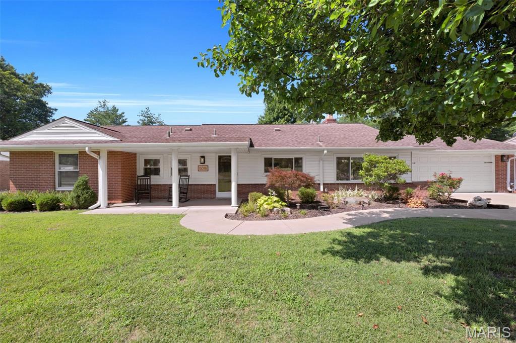 Beautiful  3 Bedroom, 2 full bath, brick ranch on nearly 1/2 acre lot in award-winning  Lindbergh School District! Great open floor plan, updated with quality finishes.  A stunning focal point is the stone wrap-around fireplace that faces both the dining room and family room. Lots of natural light make the spacious family room  bright and inviting. The kitchen has newer custom cabinetry, quartz countertops, custom tile and stainless steel appliances.   Bathroom in primary bedroom & hall bathroom have newer vanities, tile and fixtures. Special features of this home include:  heated floors in both bathrooms, cove molding in family room, large laundry/utility room, newer flooring throughout,  and covered front porch.  The back yard is level and fenced!  A utility shed, with electric provides extra space for a workshop, hobby area or even added storage.  Just off the family room is a newer concrete patio, providing the perfect place to relax and enjoy your great outdoor space. The oversized attached 2 car garage and driveway with side parking pad offer plenty  of parking space. Great location, conveniently located close to schools, shopping, restaurants and highways. VERY WELL MAINTAINED!  NO UPDATING REQUIRED! MOVE-IN READY!!