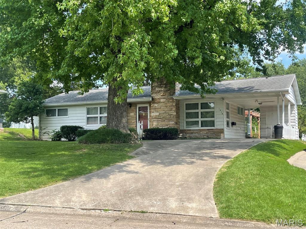 CONVENIENT LOCATION, WONDERFUL CURB APPEAL, LARGE PRIVATE BACK YARD!  This frame ranch with stone trim and fireplace has hardwood floors under all carpet and has updating potential for either an investor or a handy homeowner, although is is liveable as is.  Family room and 2nd bath is in the basement.  Roof is 11 years old, newer stainless refrigerator.  Sellers grew up in the home but have not lived there since their teen years, so disclosure is limited to information they have.  Property is priced and being sold in as-is condition.  Full exterior and interior photos will be posted when available on July 9.
